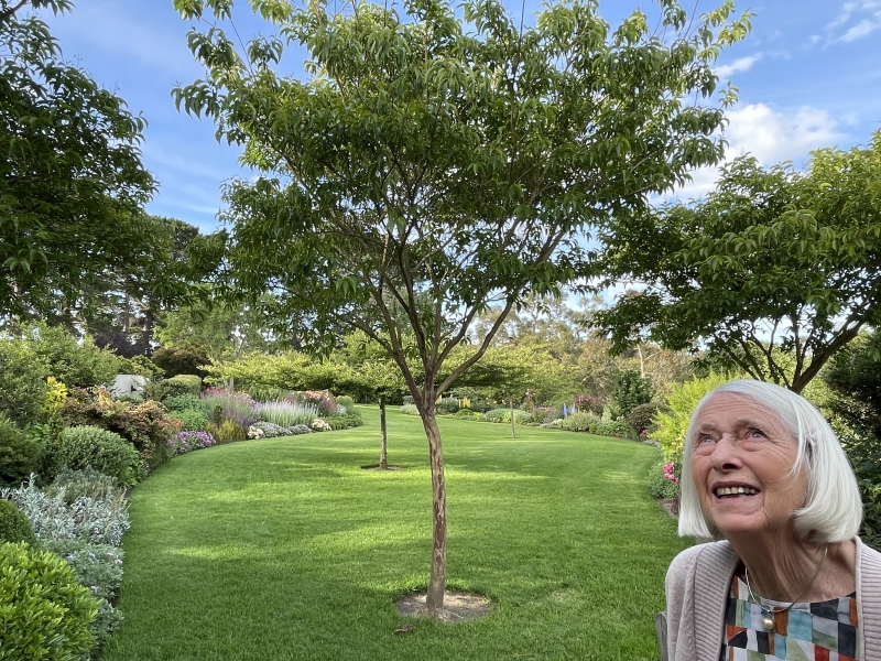 Di Johnson in her garden